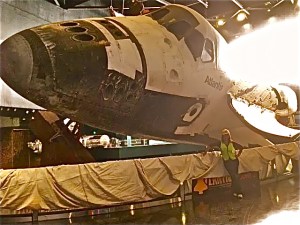 Donna Balancia with Space Shuttle Atlantis at Kennedy Space Center Visitor Complex Donna Balancia stands beside Space Shuttle Atlantis. The KSC exhibit opens to the public June 29.